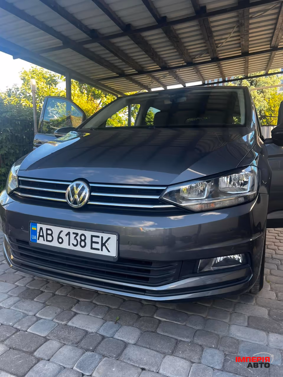 Volkswagen Touran - фото 1