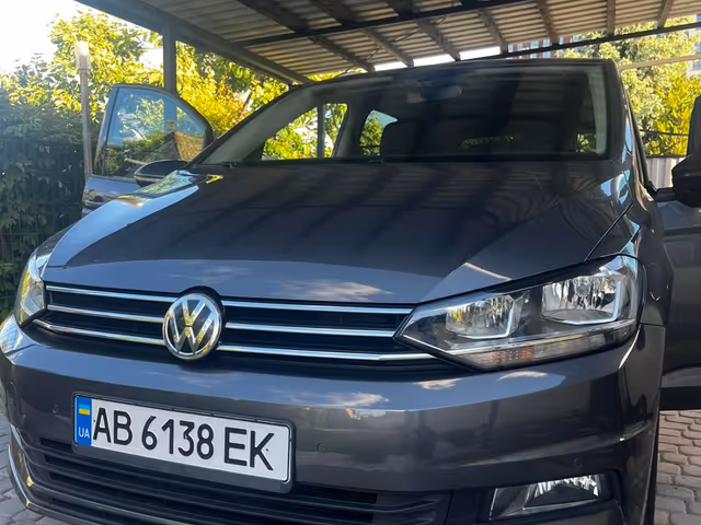 Volkswagen Touran - фото 1