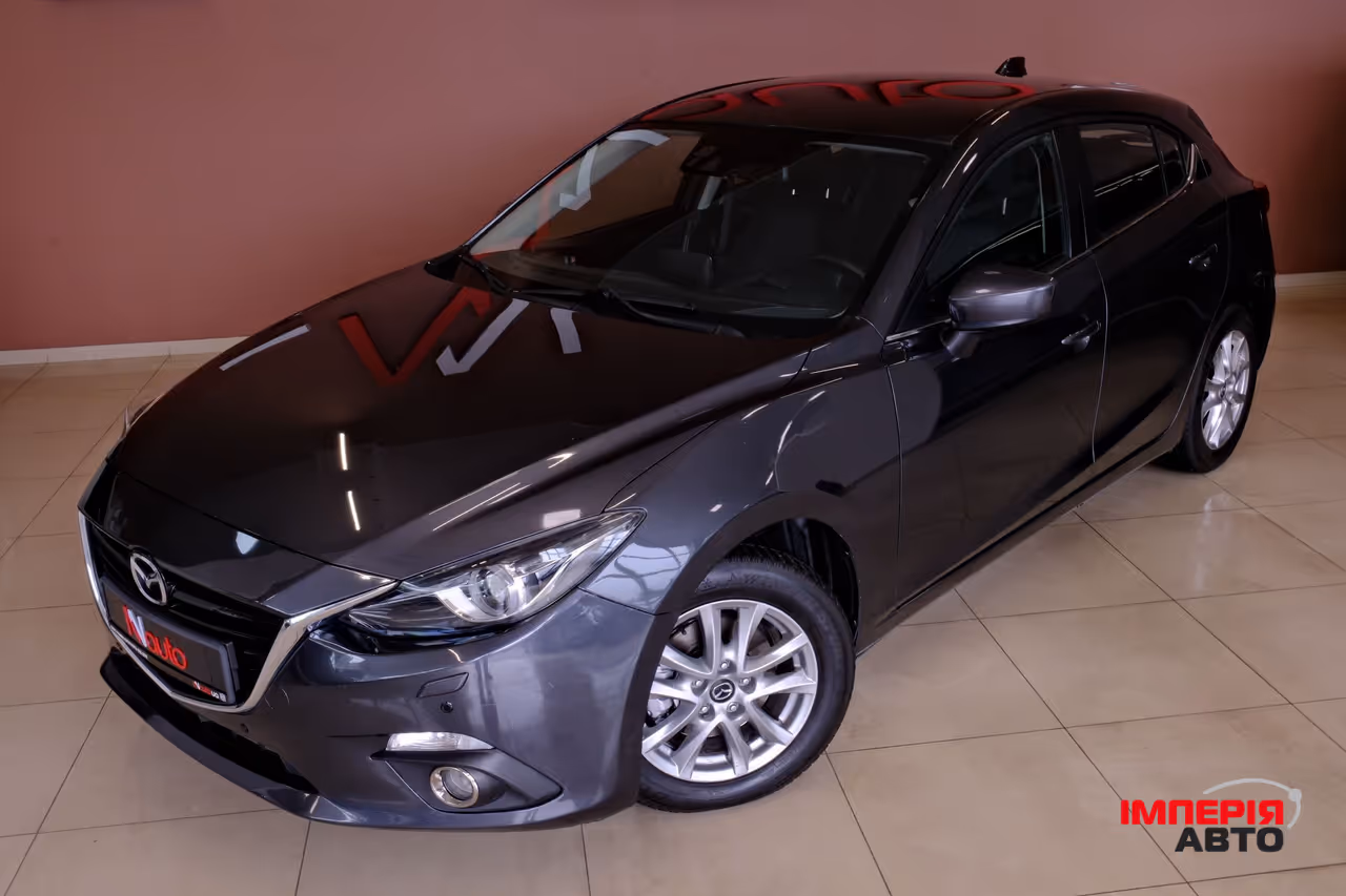 Mazda 3 - фото 2