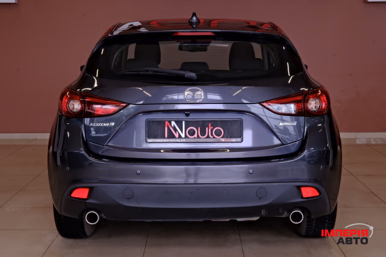 Mazda 3 - фото 6