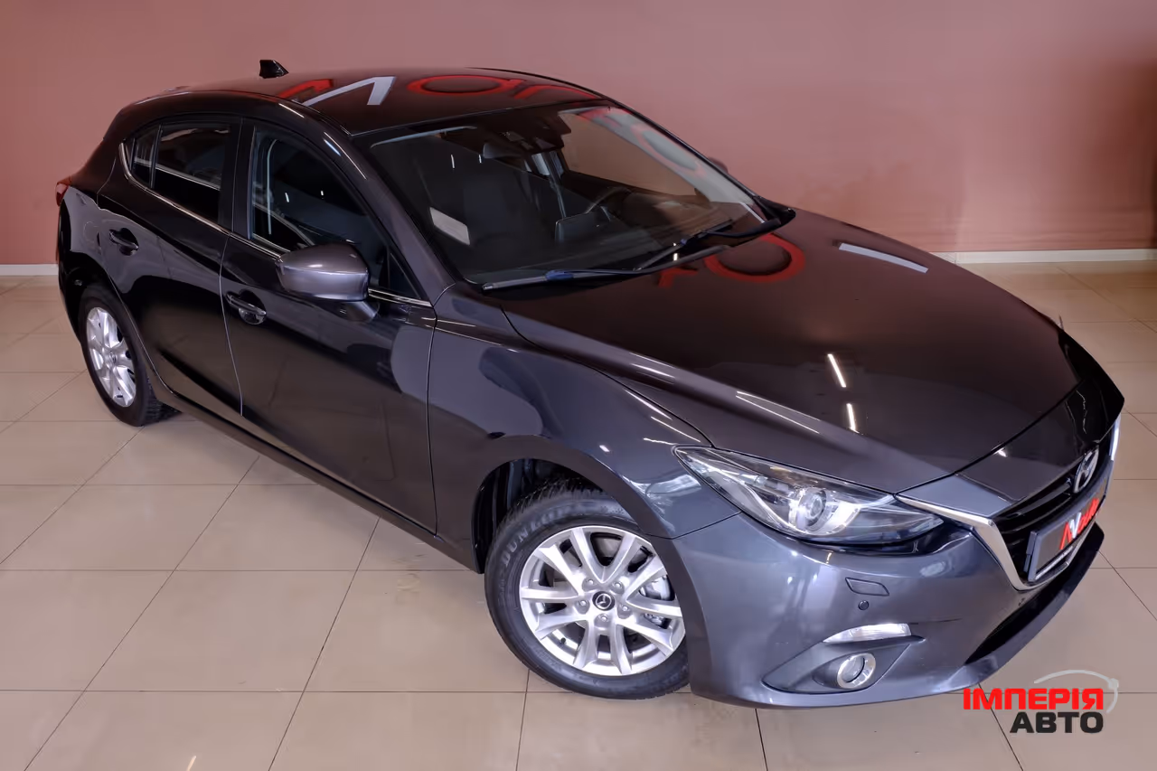 Mazda 3 - фото 4