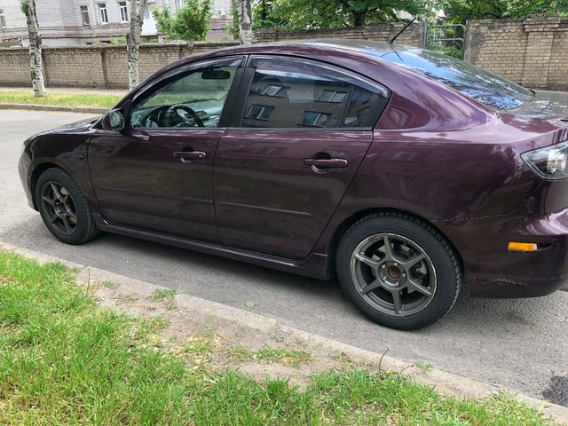 Mazda 3 - фото 4
