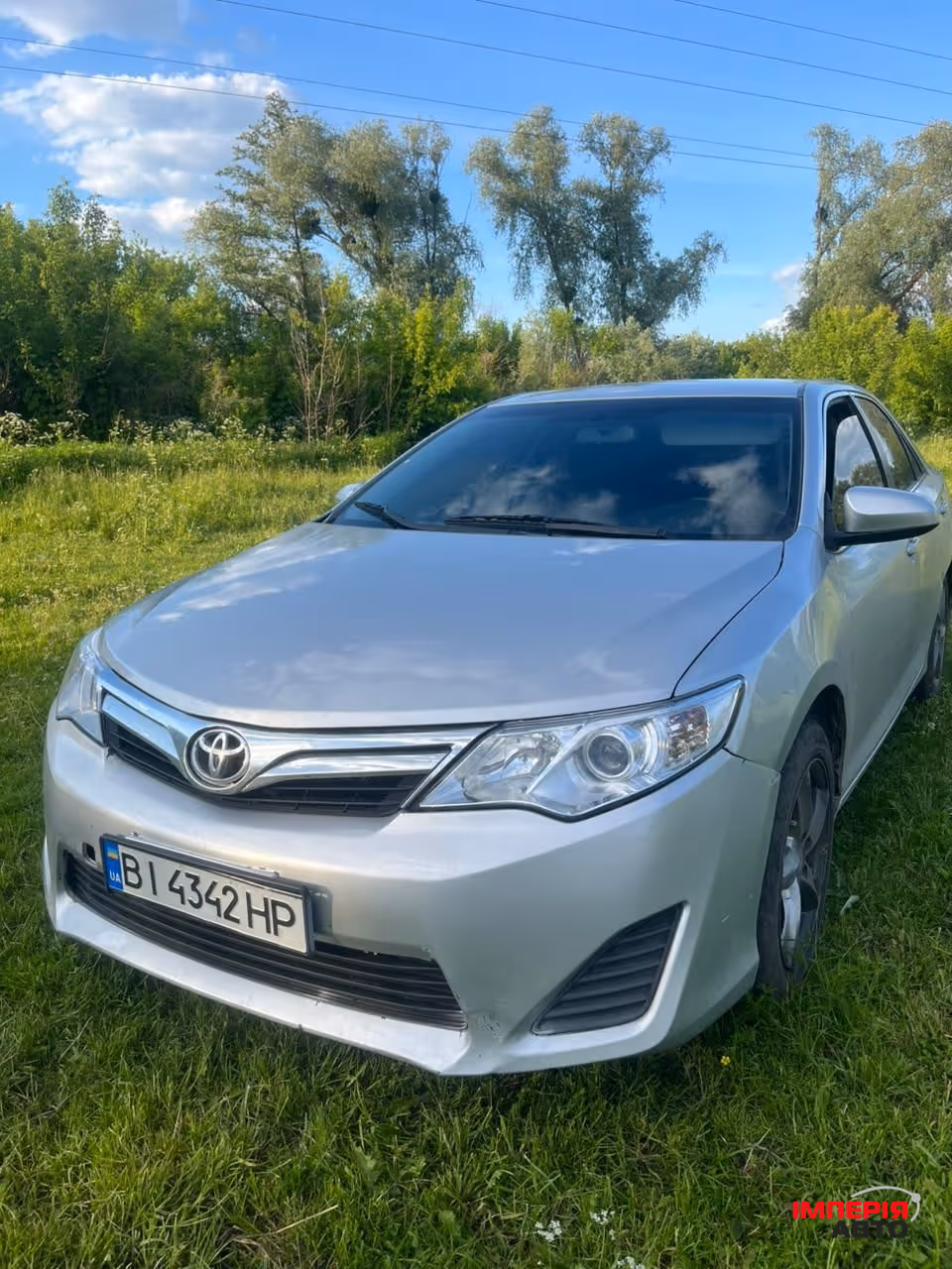 Toyota Camry - фото 1