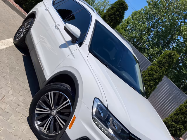 Volkswagen Tiguan - фото 1