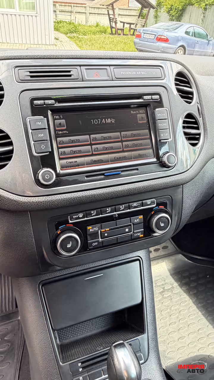 Volkswagen Tiguan - фото 8