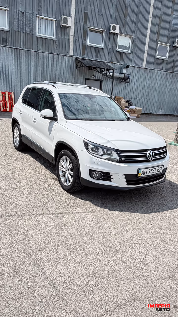 Volkswagen Tiguan - фото 1