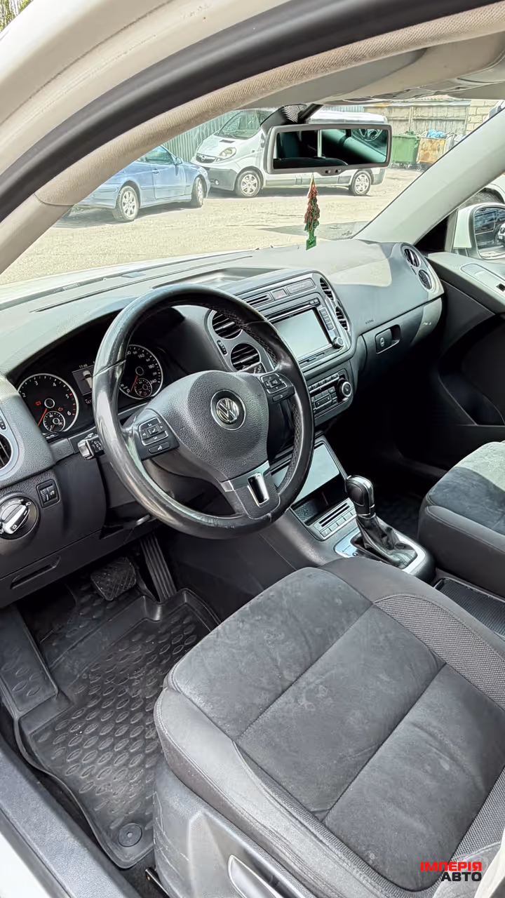 Volkswagen Tiguan - фото 6