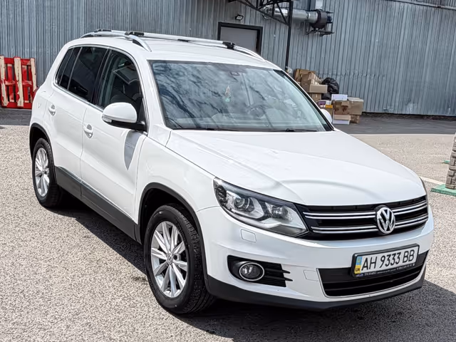 Volkswagen Tiguan - фото 1