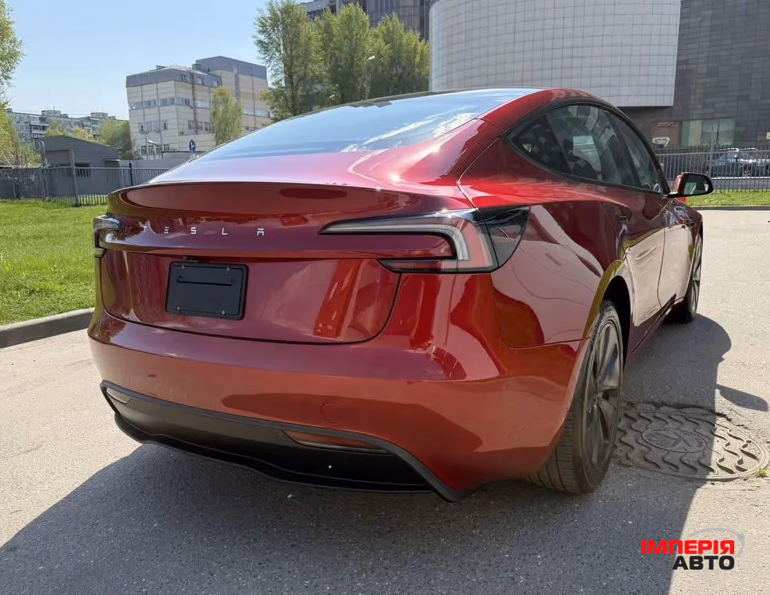 Tesla Model 3 - фото 10