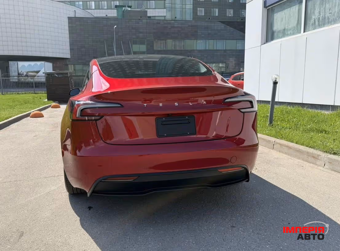 Tesla Model 3 - фото 11