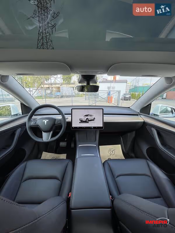 Tesla Model Y - фото 35