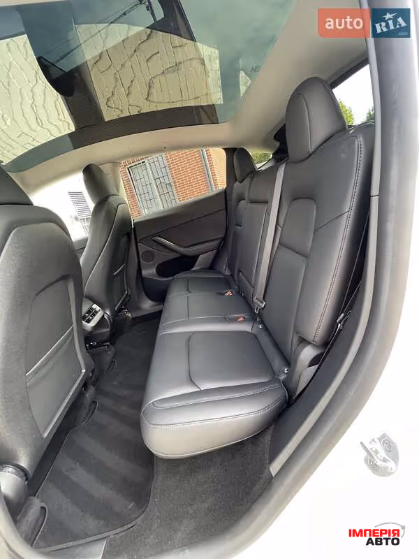 Tesla Model Y - фото 32