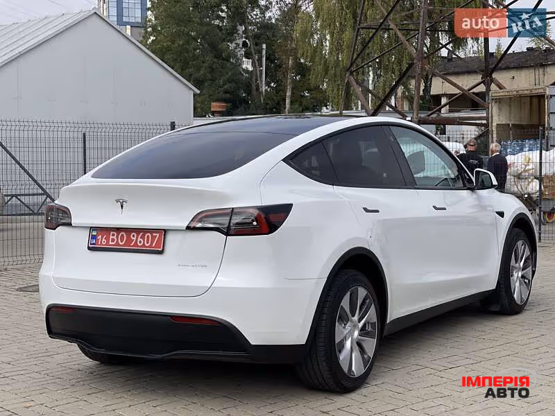 Tesla Model Y - фото 11