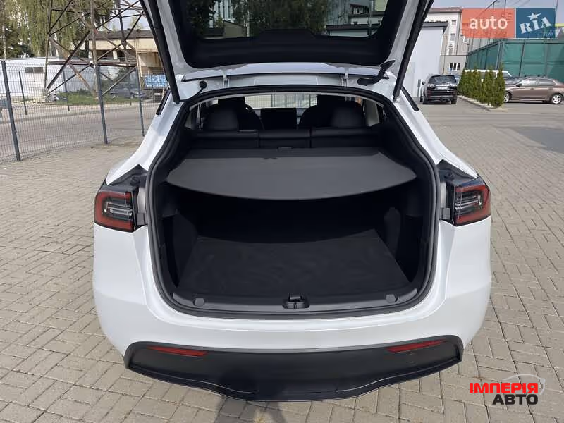Tesla Model Y - фото 13