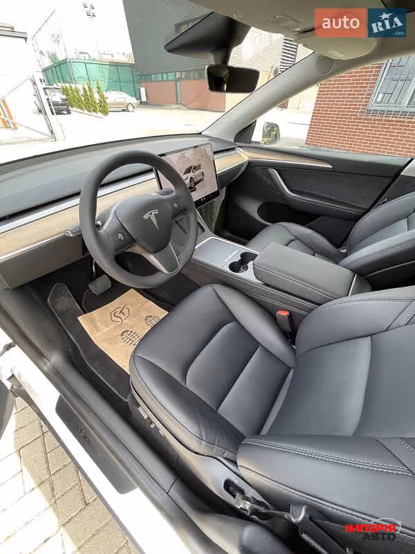 Tesla Model Y - фото 16
