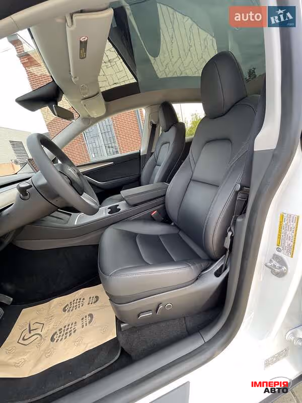 Tesla Model Y - фото 18
