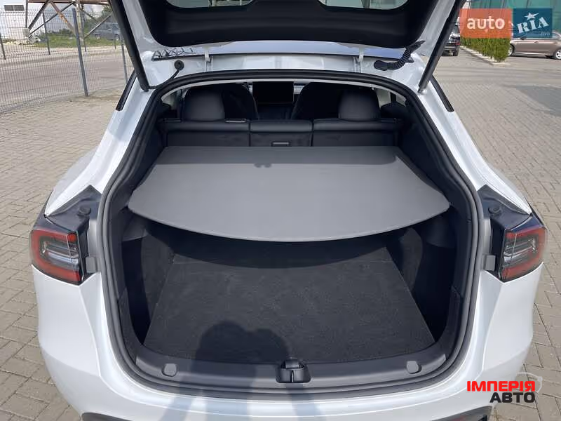 Tesla Model Y - фото 12