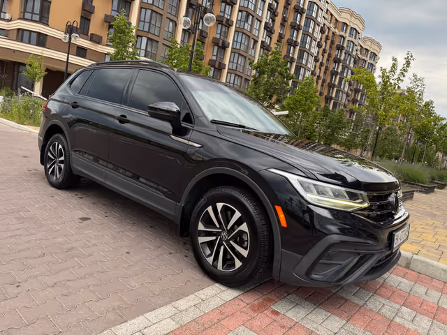 Volkswagen Tiguan - фото 1