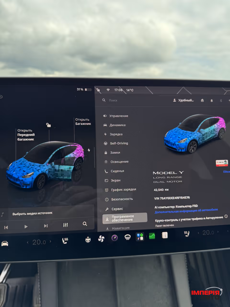 Tesla Model Y - фото 18