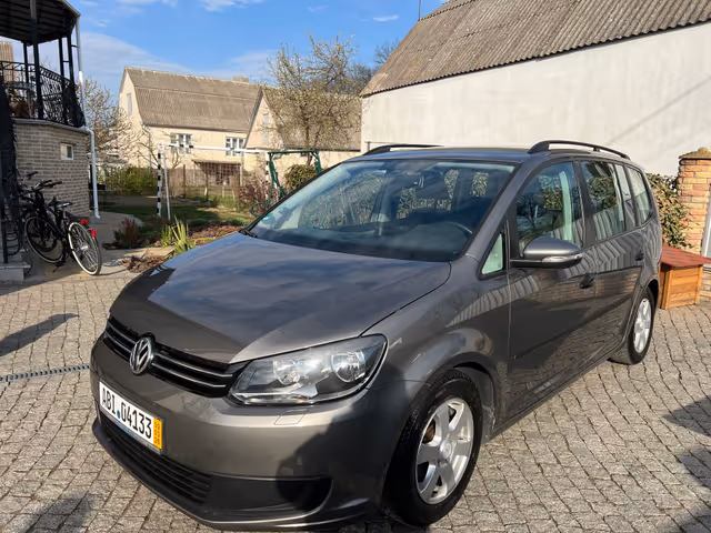 Volkswagen Touran - фото 1