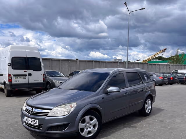 Opel Astra - фото 1