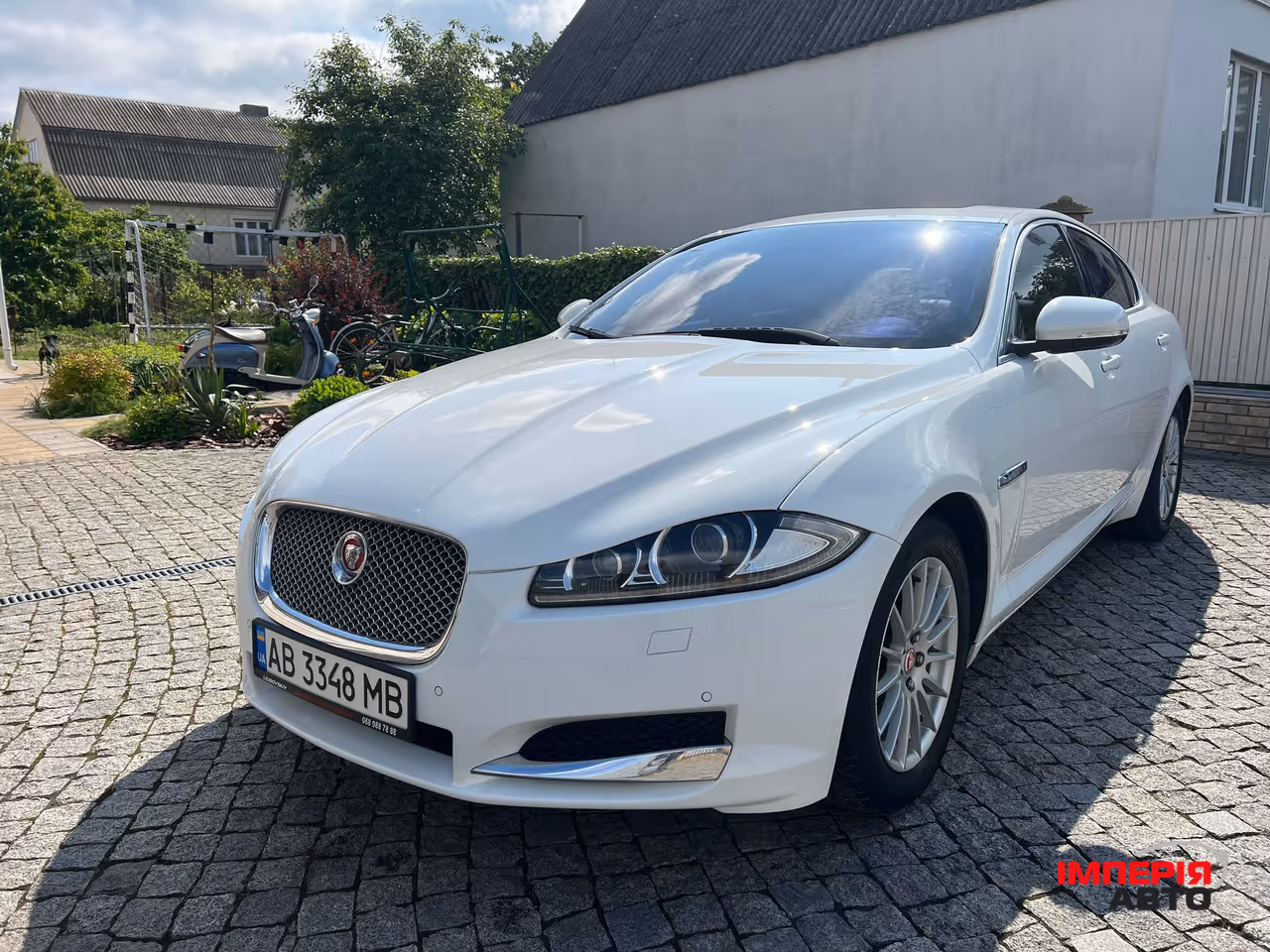Jaguar XF - фото 7