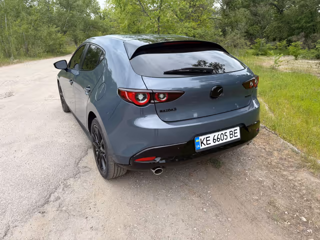 Mazda 3 - фото 5