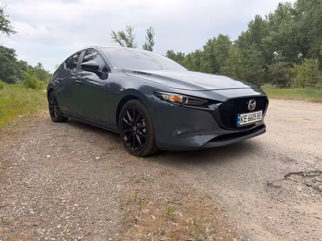 Mazda 3 - фото 2