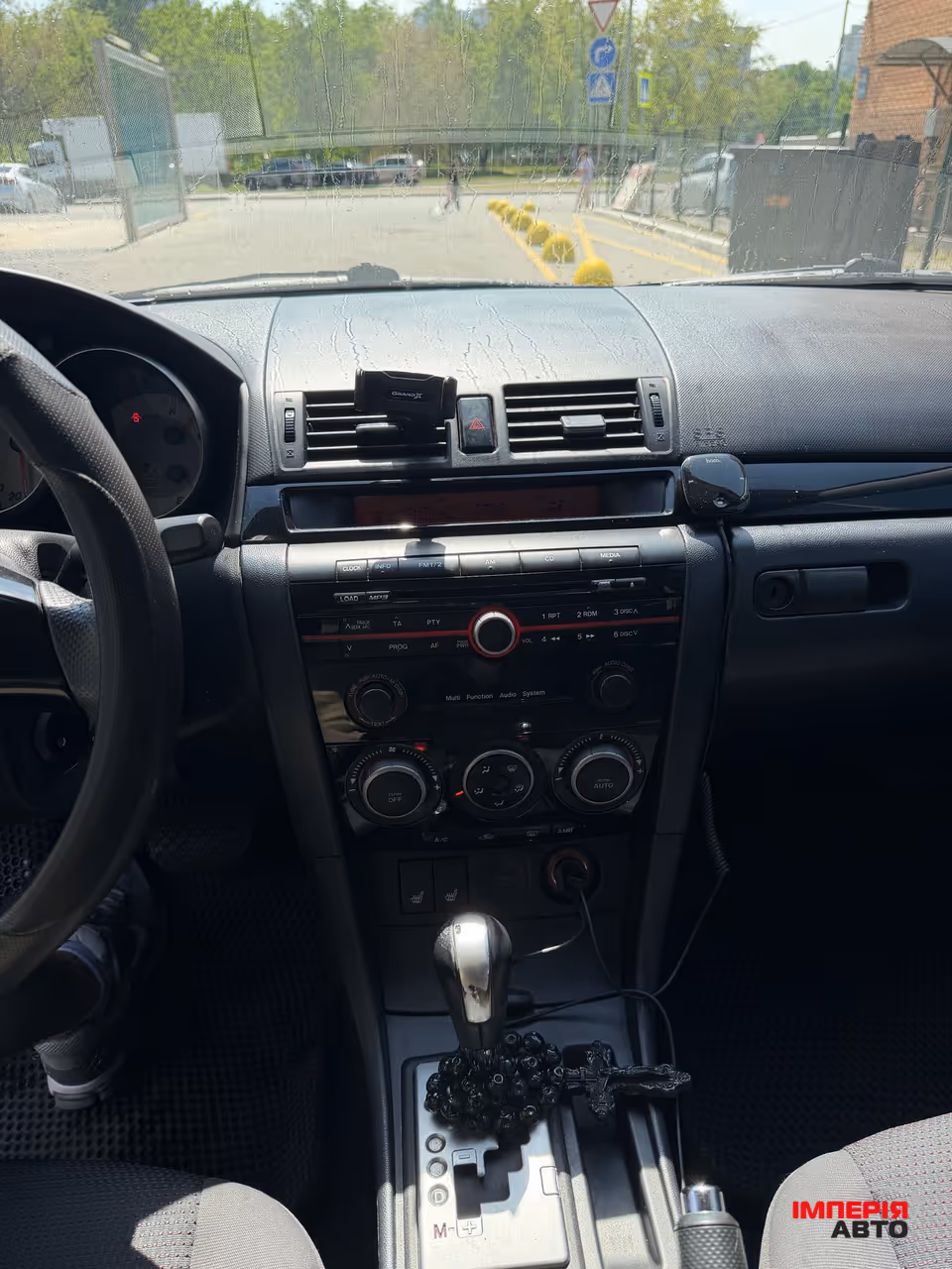 Mazda 3 - фото 9