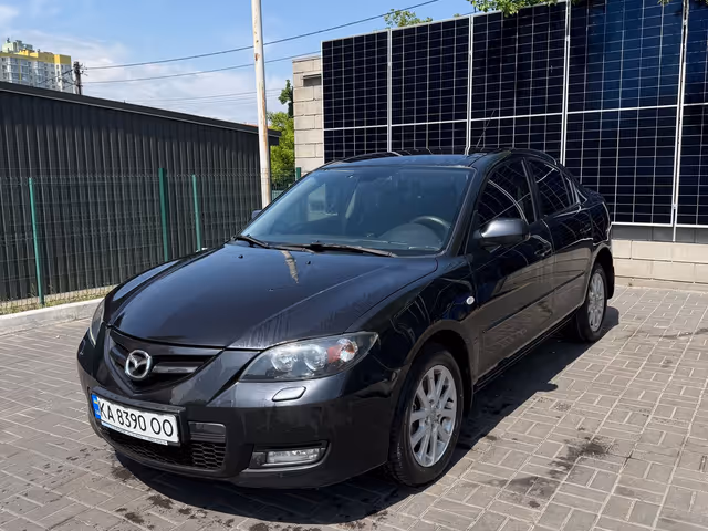 Mazda 3 - фото 2