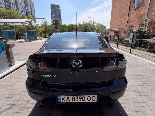 Mazda 3 - фото 4