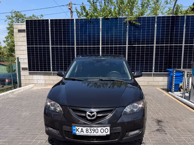 Mazda 3 - фото 1