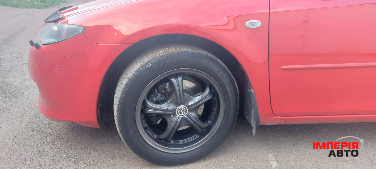 Mazda 6 - фото 10