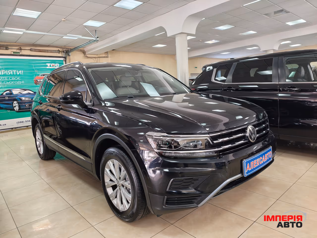 Volkswagen Tiguan - фото 1
