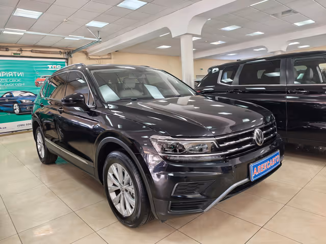 Volkswagen Tiguan - фото 1
