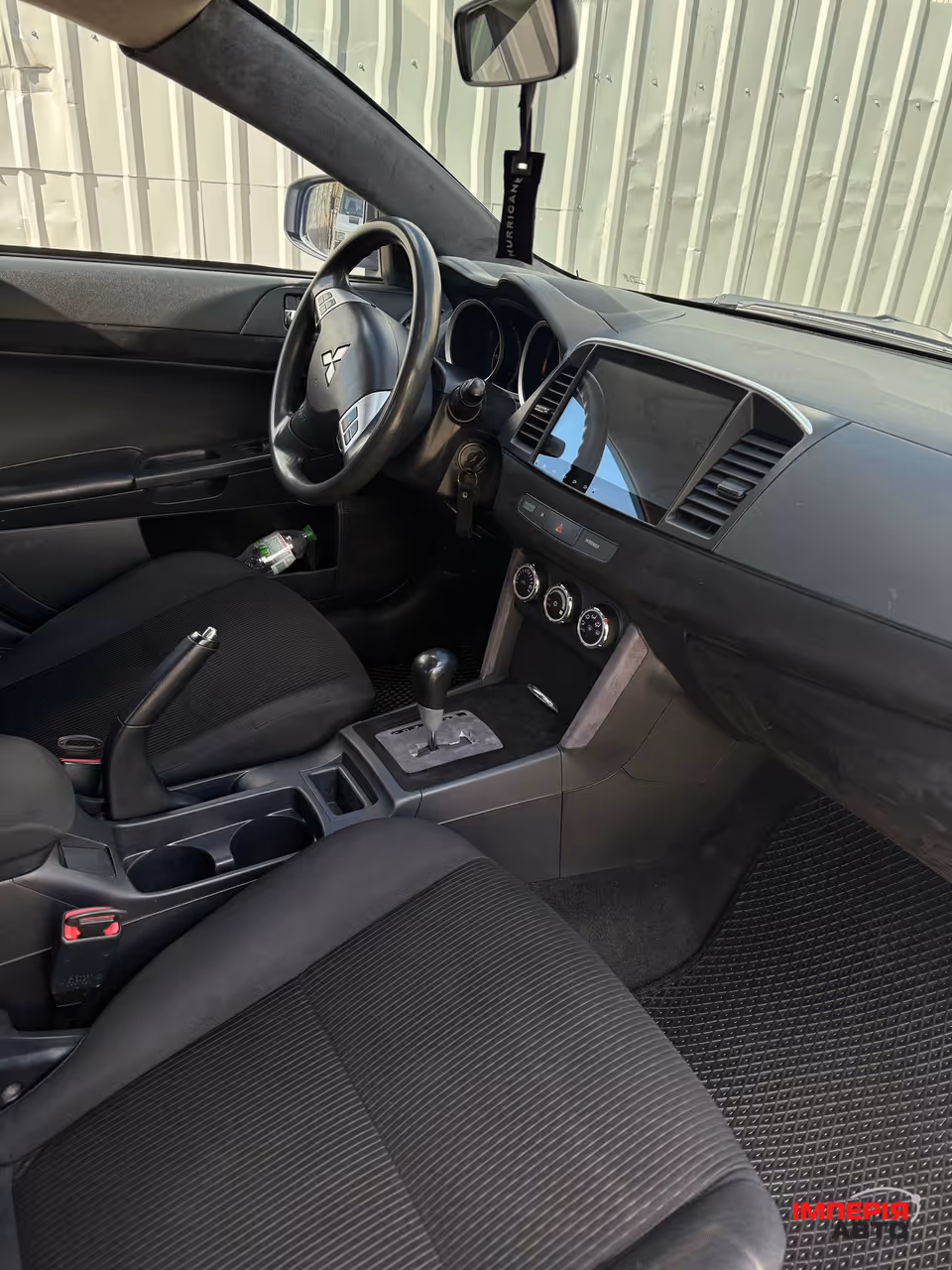 Mitsubishi Lancer - фото 7