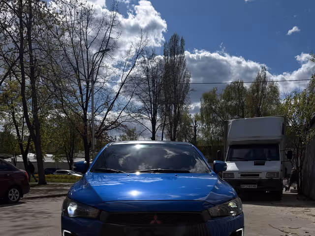 Mitsubishi Lancer - фото 1