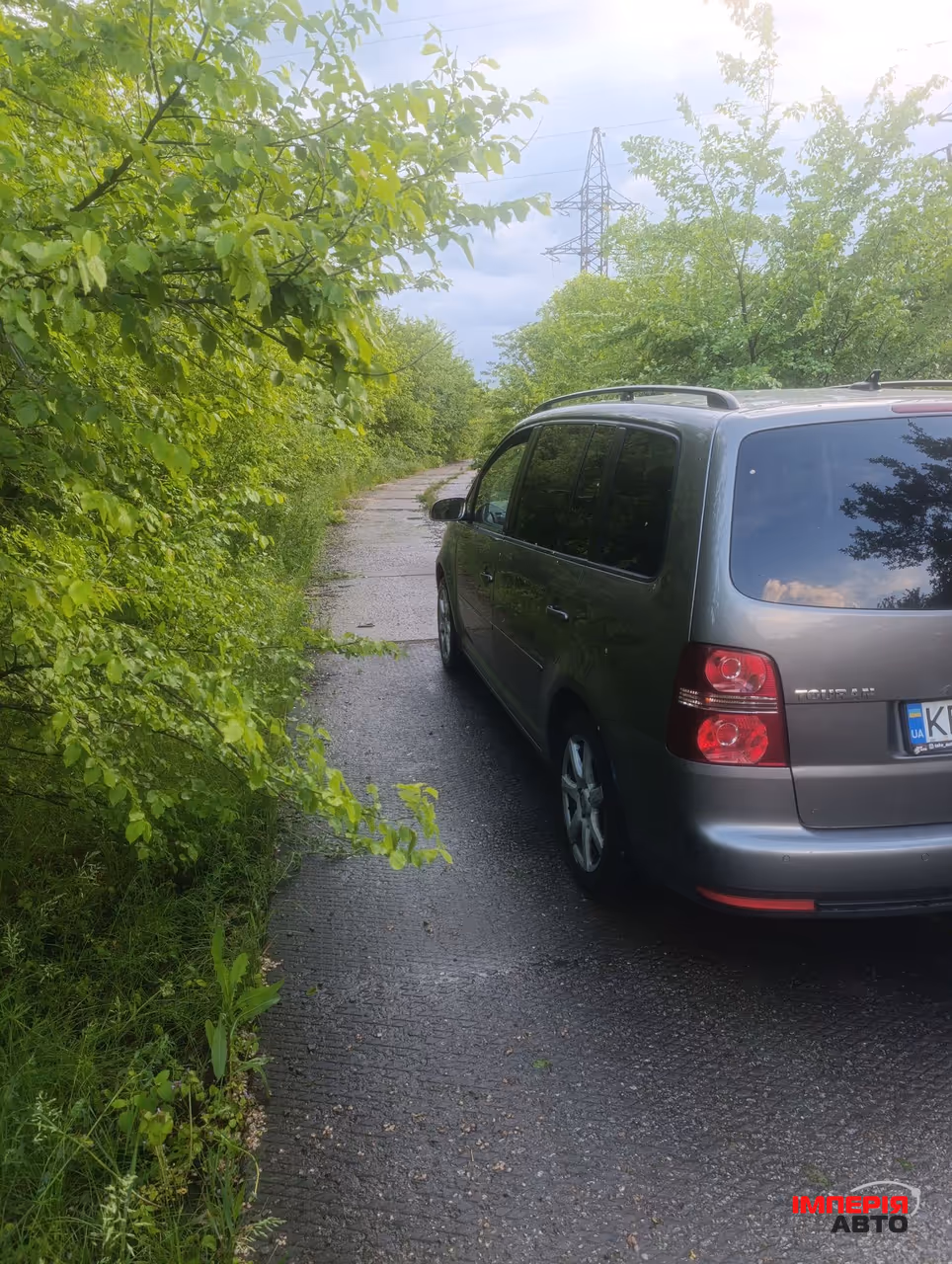 Volkswagen Touran - фото 2