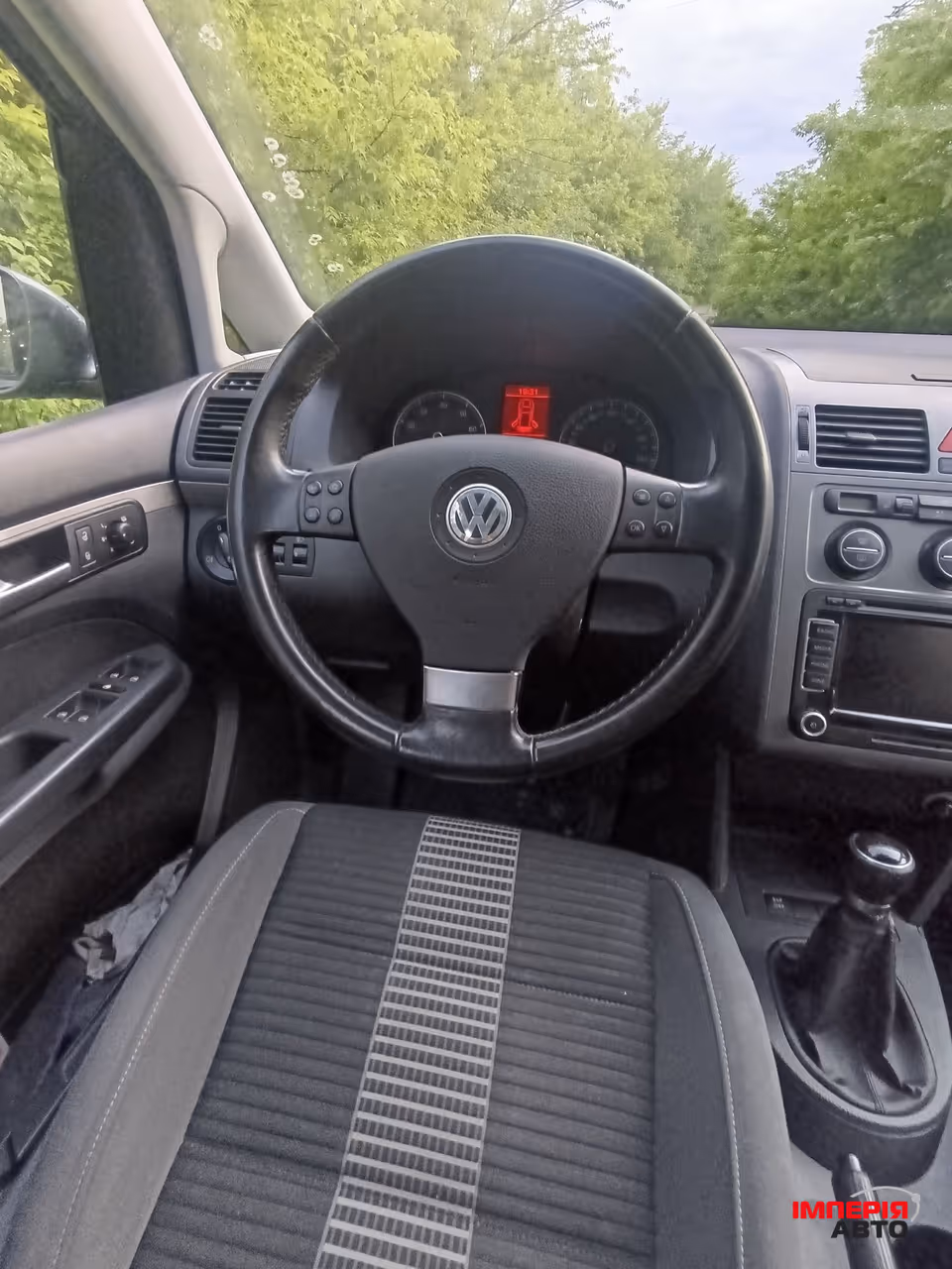 Volkswagen Touran - фото 12