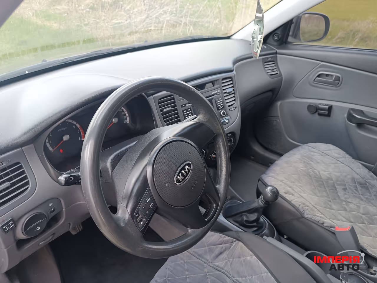 Kia Rio - фото 9