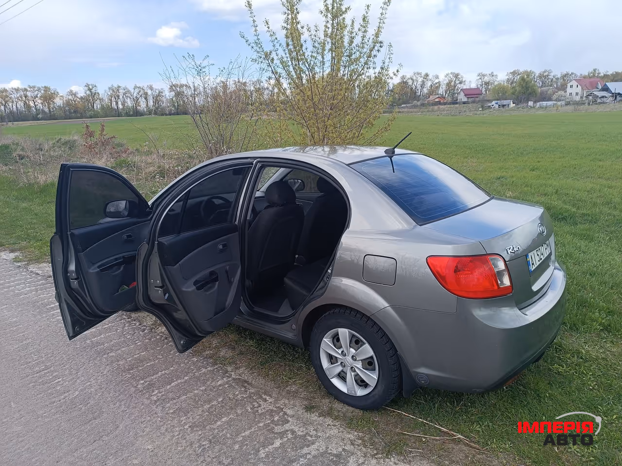 Kia Rio - фото 11