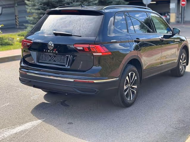 Volkswagen Tiguan - фото 4