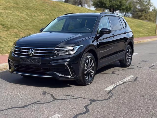 Volkswagen Tiguan - фото 1