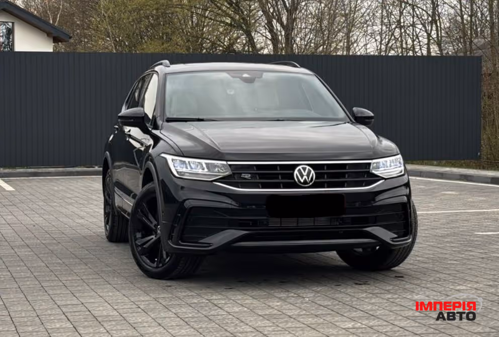 Volkswagen Tiguan - фото 1