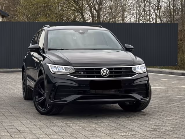 Volkswagen Tiguan - фото 1