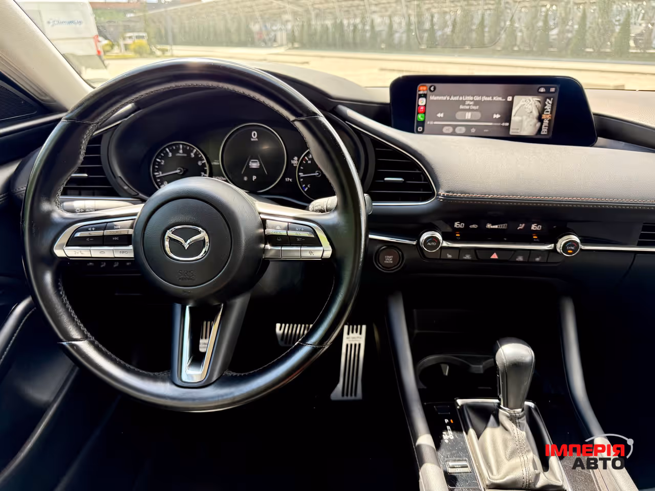 Mazda 3 - фото 14
