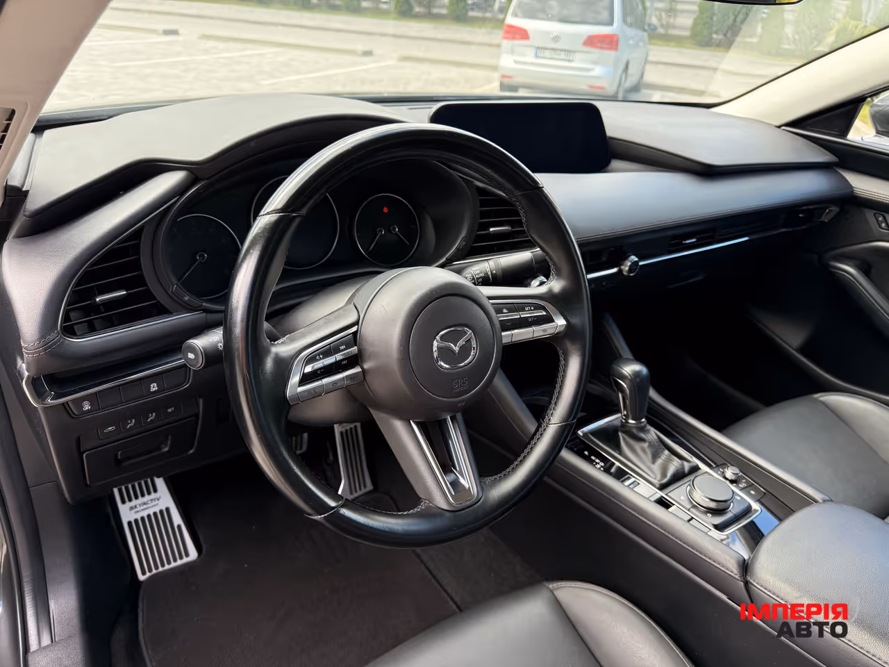 Mazda 3 - фото 11