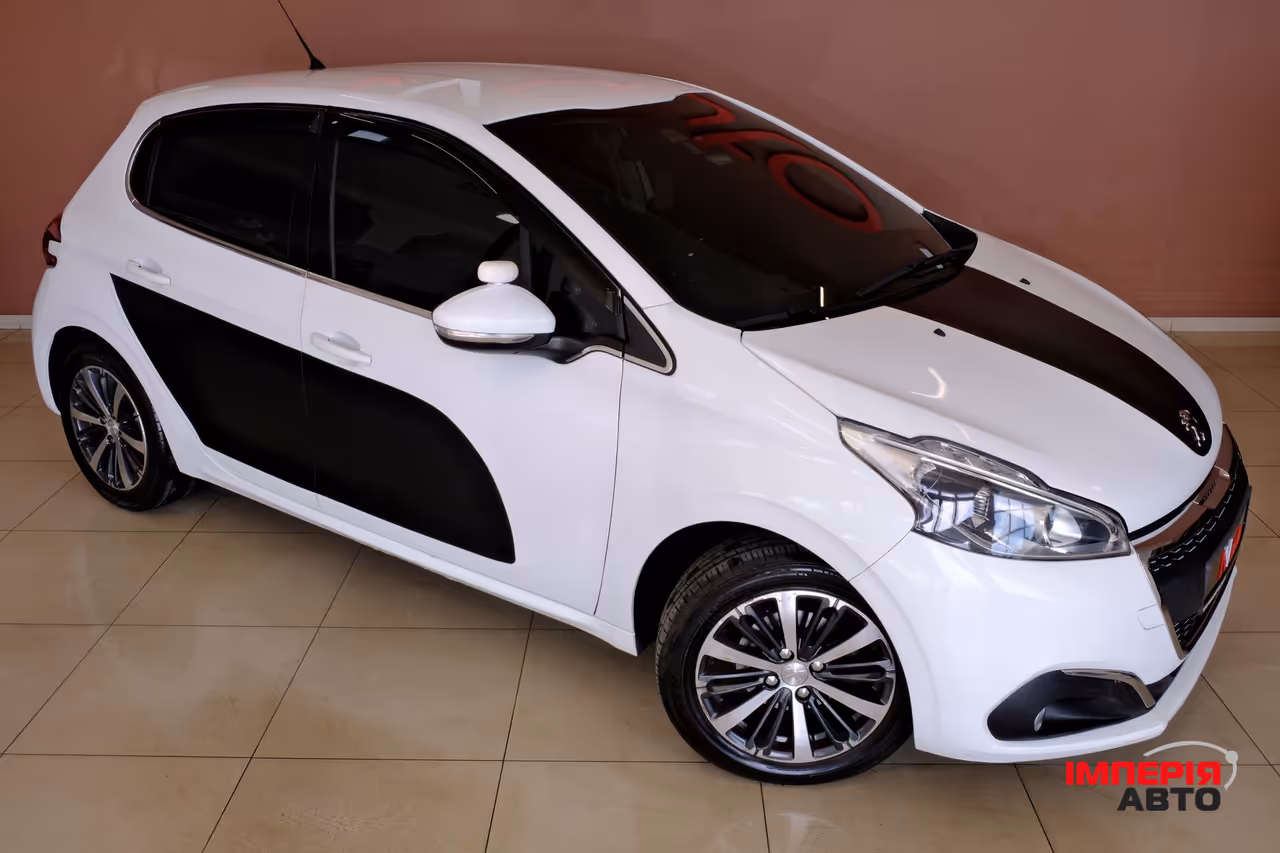 Peugeot 208 - фото 4