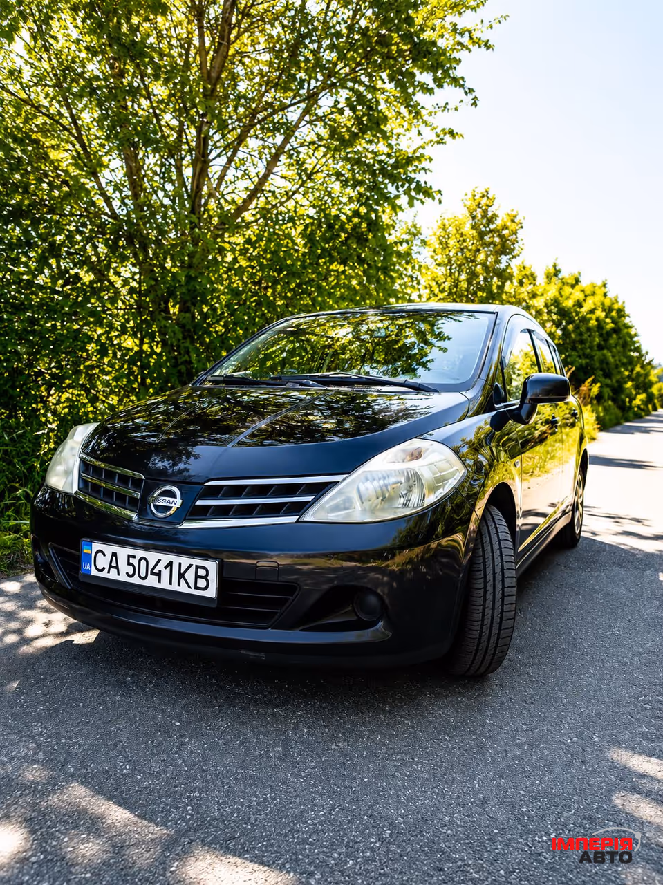 Nissan Tiida - фото 1
