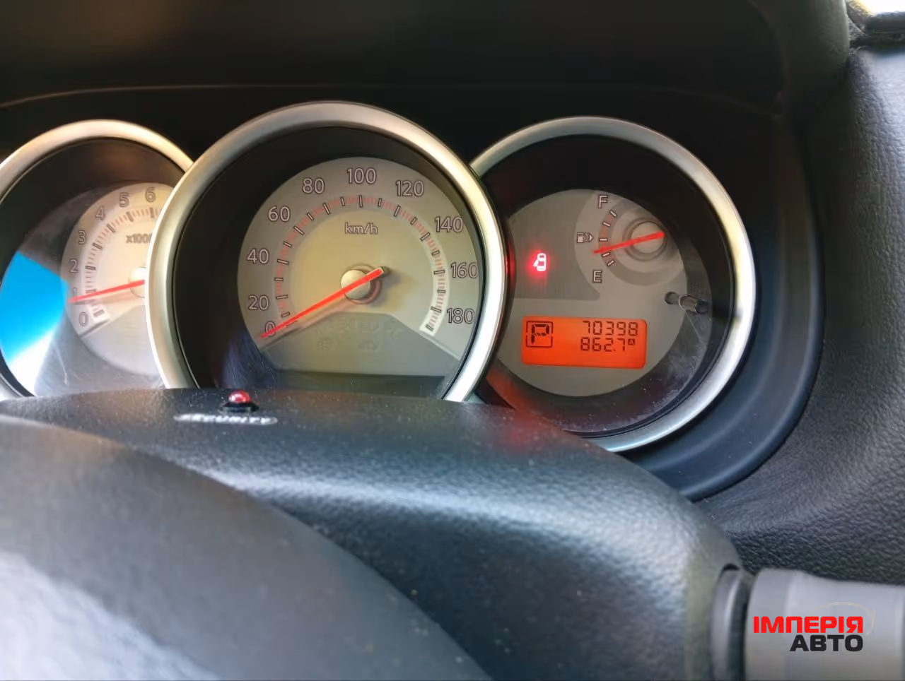 Nissan Tiida - фото 10